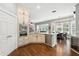 Well-appointed kitchen with custom cabinetry, premium appliances, and access to breakfast nook at 8214 Lake Serene Dr, Orlando, FL 32836