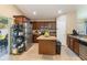 Well-equipped kitchen with stainless steel appliances, central island and lots of cabinet space at 832 Seneca Trl, St Cloud, FL 34772