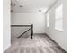 Upstairs loft area with new carpet, windows, and plenty of natural light at 8359 Lookout Pointe Dr, Windermere, FL 34786