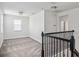 Spacious loft area is perfect for a playroom or media room at 8359 Lookout Pointe Dr, Windermere, FL 34786