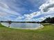 View of a peaceful pond within the community at 8359 Lookout Pointe Dr, Windermere, FL 34786
