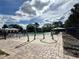 Interactive splash pad area with water features, set in a safe, brick-paved area near the community pool at 8359 Lookout Pointe Dr, Windermere, FL 34786
