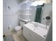 Clean bathroom with a modern vanity, updated fixtures, and a tiled shower at 956 Florida Pkwy, Kissimmee, FL 34743