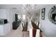 Open-concept dining room that flows into the living room and kitchen, with bright neutral colors at 956 Florida Pkwy, Kissimmee, FL 34743