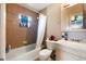 Bathroom with a tub and shower combination, and a vanity with sink at 1 Coyer Rd, Haines City, FL 33844