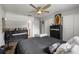Bedroom with hardwood floors, closet, and ceiling fan at 1 Coyer Rd, Haines City, FL 33844
