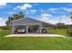 The property features a large detached garage for multiple vehicles at 1 Coyer Rd, Haines City, FL 33844