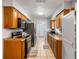 Functional kitchen with ample cabinet space, modern appliances, and neutral countertops at 1 Coyer Rd, Haines City, FL 33844