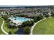 Community pool with lounge chairs and shade umbrellas, perfect for relaxation at 11051 Bostwick Aly, Winter Garden, FL 34787