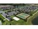Aerial view of community tennis and volleyball courts, offering recreational opportunities at 11051 Bostwick Aly, Winter Garden, FL 34787