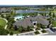 Beautiful aerial view of the community clubhouse, pool, and surrounding lake at 11051 Bostwick Aly, Winter Garden, FL 34787