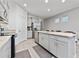 Bright and spacious kitchen featuring stainless steel appliances, and center island with seating at 11051 Bostwick Aly, Winter Garden, FL 34787