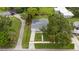 Aerial view of the property showcasing its location, lot size, landscaping, and neighborhood surroundings at 113 W Division St, Winter Garden, FL 34787