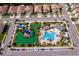 Aerial view of the community's playground and pool on a sunny day at 1173 Trappers Trail Loop, Champions Gate, FL 33896
