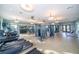 Bright fitness center with modern equipment, including treadmills and weight machines at 1173 Trappers Trail Loop, Champions Gate, FL 33896