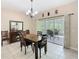 Dining room features sliding glass doors leading to outdoor patio at 125 Prima Dr, Poinciana, FL 34759