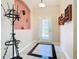 Welcoming foyer with decorative tile, accent wall, and stylish decor at 125 Prima Dr, Poinciana, FL 34759