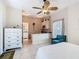 This quaint kitchenette includes granite countertops, cabinetry, stainless steel appliances, and a large window at 125 Prima Dr, Poinciana, FL 34759