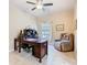 Cozy office space features a desk, chair, and natural light from the window at 125 Prima Dr, Poinciana, FL 34759