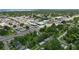 Aerial view of the neighborhood, showcasing the property's location near local businesses and roadways at 1322 New York Ave, St Cloud, FL 34769