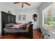Bedroom featuring wood floors, natural light and ceiling fan at 1322 New York Ave, St Cloud, FL 34769