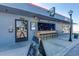Inviting restaurant exterior featuring outdoor seating, modern lighting, and a welcoming entrance at 1322 New York Ave, St Cloud, FL 34769