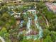 Community lazy river winding through lush landscaping, offering a relaxing water activity for residents at 1416 Oak Marsh St, Davenport, FL 33837