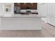 Modern kitchen with stainless steel appliances and a large island at 1416 Oak Marsh St, Davenport, FL 33837