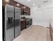Modern kitchen with stainless steel appliances at 1416 Oak Marsh St, Davenport, FL 33837