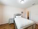 Well-lit bedroom boasts wood floors, a closet, and a neutral color scheme at 14234 Desert Haven St # 14234, Windermere, FL 34786