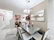 Dining area with chandelier, mirror and easy access to the kitchen at 14234 Desert Haven St # 14234, Windermere, FL 34786