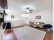 Bright living room features hardwood floors, neutral colors, and ceiling fan at 14234 Desert Haven St # 14234, Windermere, FL 34786