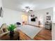 Spacious living room featuring wood floors, a ceiling fan, and comfortable seating at 14234 Desert Haven St # 14234, Windermere, FL 34786