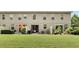 Wide backyard featuring a lush lawn, patio, sliding doors, and privacy fence at 196 Canterbury Bell Dr, Oviedo, FL 32765