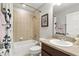 Cozy bathroom showcasing a shower-tub combo, ceramic tile, and modern vanity at 196 Canterbury Bell Dr, Oviedo, FL 32765