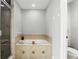 Luxurious bathroom featuring a shower and a soaking tub with decorative tile accents at 196 Canterbury Bell Dr, Oviedo, FL 32765