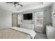 Bright bedroom with tray ceilings, lots of natural light, and neutral decor at 196 Canterbury Bell Dr, Oviedo, FL 32765