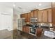 Granite countertops, stainless steel appliances, and ample cabinet space enhance this modern kitchen at 196 Canterbury Bell Dr, Oviedo, FL 32765