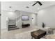 Spacious living area with tile flooring and staircase in view at 196 Canterbury Bell Dr, Oviedo, FL 32765
