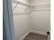 Walk-in closet with wire shelving for organized storage and easy access at 202 Bromwich Dr, Kissimmee, FL 34758