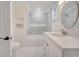 Updated bathroom with stylish vanity, shower with tile surround, and modern fixtures at 2525 Ridgeway Dr, Kissimmee, FL 34746