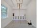 Bright dining room with modern chandelier and sleek built-in cabinets at 2525 Ridgeway Dr, Kissimmee, FL 34746