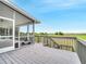 Exterior view of a screened-in porch with a scenic backdrop at 2525 Ridgeway Dr, Kissimmee, FL 34746