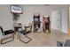 Game room with table and chair set, arcade game machines, and television at 2525 Ridgeway Dr, Kissimmee, FL 34746