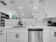 Bright kitchen featuring stainless steel appliances, quartz countertops, and a modern faucet at 2525 Ridgeway Dr, Kissimmee, FL 34746