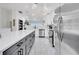 Spacious kitchen with stainless steel appliances, a large island, and an open layout flowing into living areas at 2525 Ridgeway Dr, Kissimmee, FL 34746