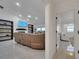 This luxurious living room offers sleek tile, modern fireplace, and comfortable seating for relaxing and entertaining at 2525 Ridgeway Dr, Kissimmee, FL 34746