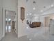 Open concept living room with modern finishes, recessed lighting, and views to the outdoor spaces at 2525 Ridgeway Dr, Kissimmee, FL 34746