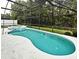 Screened-in pool with hot tub, set in a private backyard for a relaxing outdoor experience at 2591 Oneida Loop, Kissimmee, FL 34747
