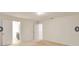 Spacious bedroom with neutral carpet, white walls and doors to bathroom and hallway at 2833 Noble Crow Dr, Kissimmee, FL 34744